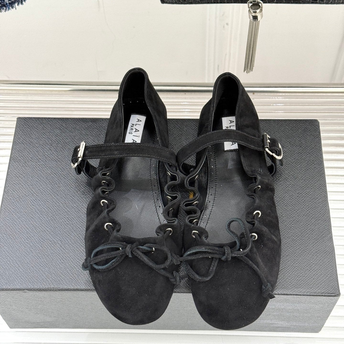 ALAIA 26S MARY JANE FLATS IN BLACK SUEDE WITH BOW