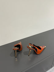 RED GEM-STUDDED SLINGBACK PUMPS IN ORANGE PATENT CALFSKIN