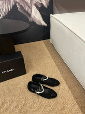 CHANEL 26S MARY JANE PEARL STRAP FLATS IN BLACK CALFSKIN