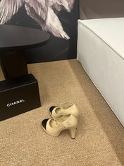 CHANEL 26S MARY JANE HEELS IN BEIGE CALFSKIN WITH BLACK CAP TOE