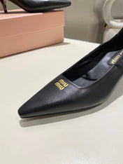 POINTED-TOE MID HEEL PUMPS IN BLACK SMOOTH LAMBSKIN