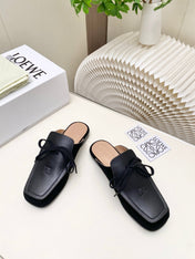 LOEWE 26S FLAT MULES IN BLACK CALFSKIN AND SUEDE