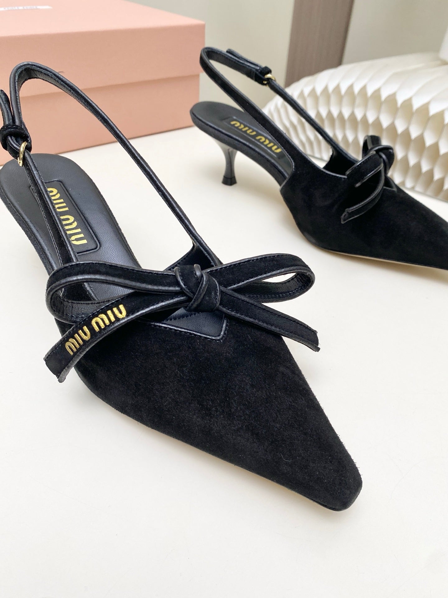 MIUMIU 26S SLINGBACK PUMPS 55MM IN BLACK SUEDE WITH BOW
