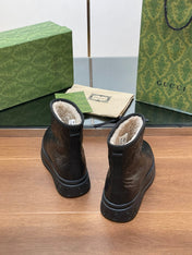 GG UGG BOOTS IN BLACK EMBOSSED DEERSKIN AND BEIGE WOOL LINING