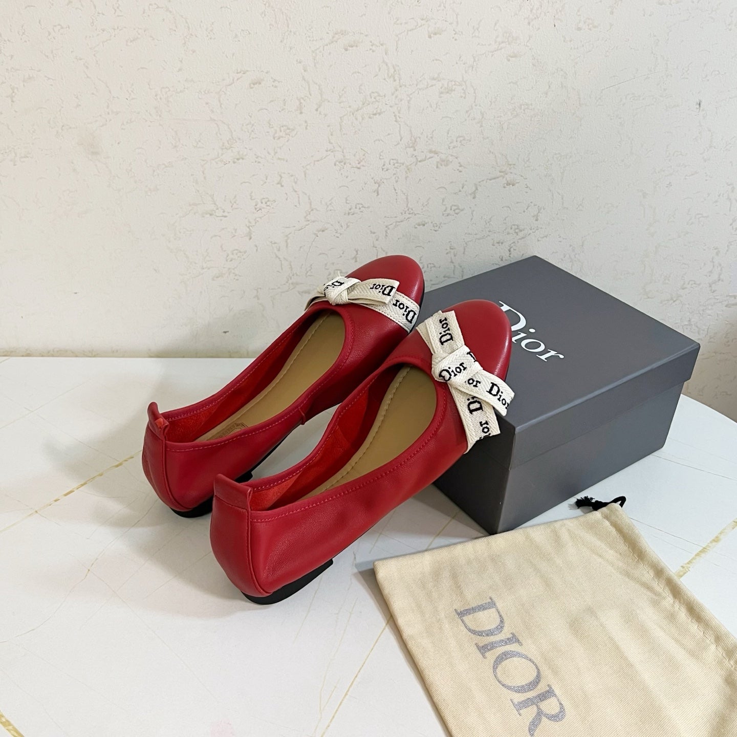 DIOR 26S BOW BALLET FLATS IN DARK RED CALFSKIN