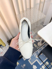 THE ROW 26S BALLET FLATS IN IVORY WHITE CALFSKIN ELASTIC TRIM WITH BOW