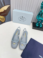 PRADA 26S ROUND TOE SLINGBACK PUMPS 40MM IN LIGHT BLUE CALFSKIN WITH BOW