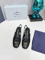 PRADA 26S ROUND TOE SLINGBACK PUMPS 40MM IN BLACK CALFSKIN WITH BOW