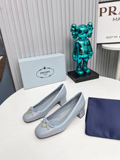 PRADA 26S ROUND TOE PUMPS BLOCK HEEL 40MM IN LIGHT BLUE CALFSKIN WITH BOW