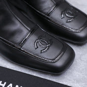 CHANEL 26S KNEE HIGH BOOTS IN BLACK CALFSKIN WITH PATENT LEATHER TRIM AND CC LOGO ON TOE CAP
