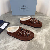 PRADA 26S WOVEN MULES IN DARK BROWN SUEDE