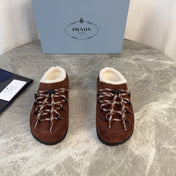 PRADA 26S WOVEN MULES IN DARK BROWN SUEDE