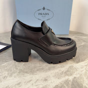 PRADA 26S HEELED LOAFERS 85 MM IN BLACK SMOOTH CALFSKIN