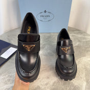 PRADA 26S HEELED LOAFERS 85 MM IN BLACK SMOOTH CALFSKIN