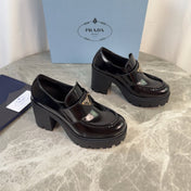 PRADA 26S HEELED LOAFERS 85 MM IN BLACK CALFSKIN