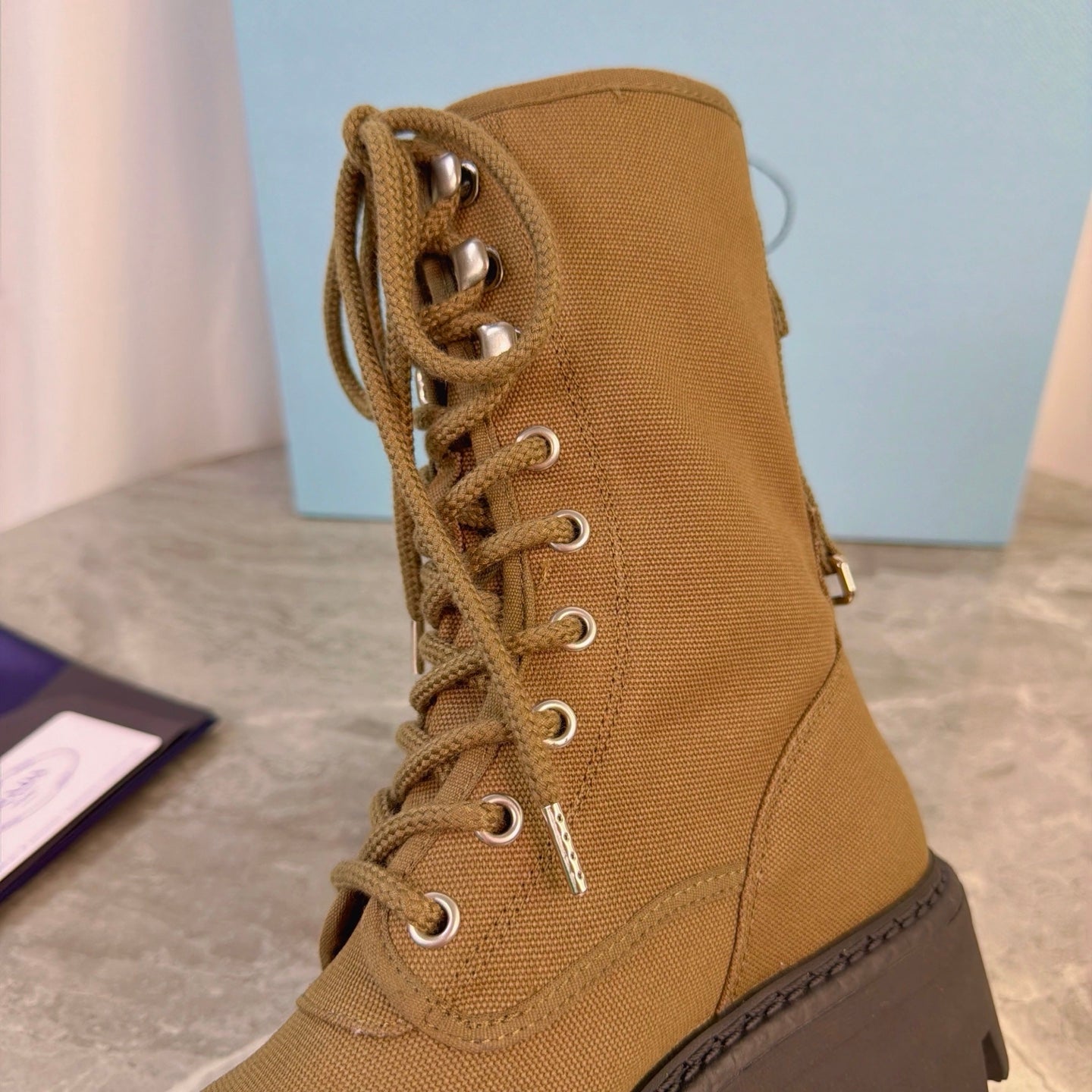 PRADA 26S LACE-UP COMBAT BOOTS IN BROWN CANVAS