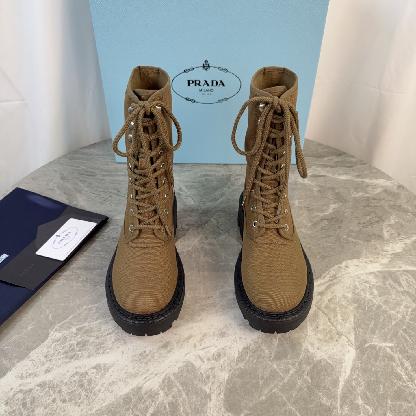 PRADA 26S LACE-UP COMBAT BOOTS IN BROWN CANVAS
