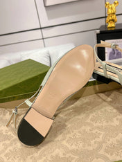 METALIC SLINGBACK FLATS IN PISTACHIO GREEN CALFSKIN