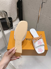 LV 26S FLAT SLIDES IN WHITE CANVAS WITH PINK BLOSSOM PRINT