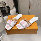 LV 26S FLAT SLIDES IN WHITE CANVAS WITH PINK BLOSSOM PRINT
