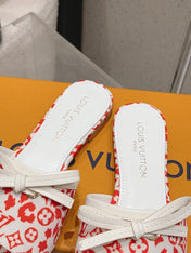 LV 26S FLAT MULE SANDALS IN WHITE RED MONOGRAM CANVAS WITH CALFSKIN BOW