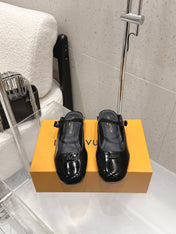 LV 26S FLAT MULES IN BLACK PATENT CALFSKIN