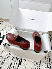 LOAFERS IN RED CALFSKIN HARDWARE WITH ROCK MIX CHAIN