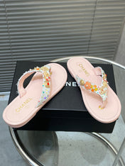 THONG SLIPPERS IN LIGHT PINK SOFT LEATHER WITH LOGO STICKER DETAIL