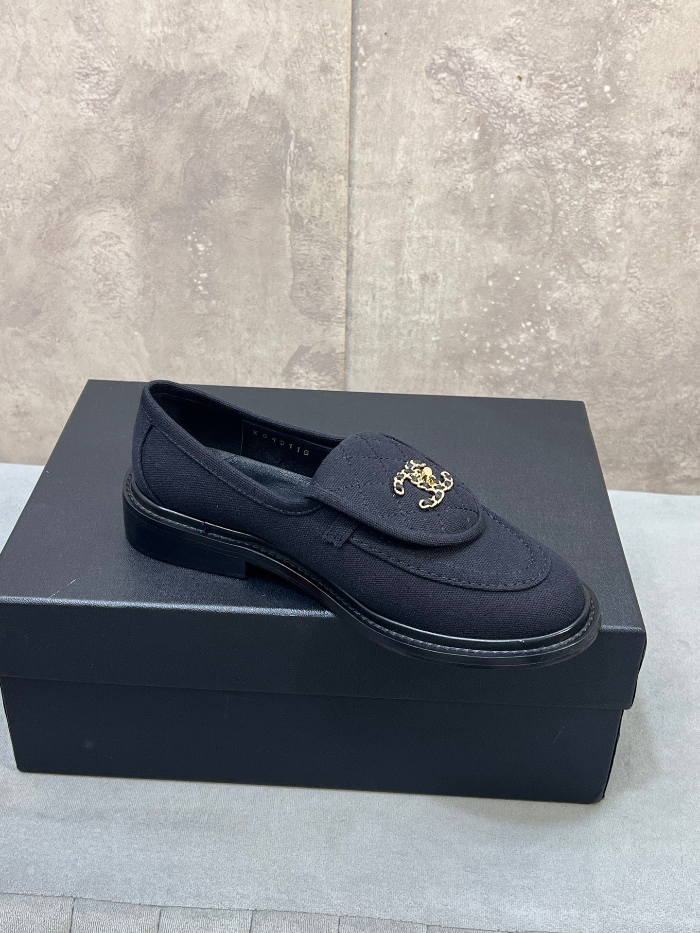 CHANEL 26S LOAFERS IN BLACK CANVAS WITH QUILTED FLAP & CHAIN CC LOGO
