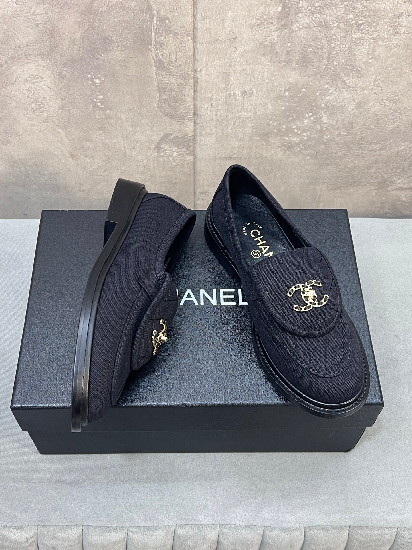 CHANEL 26S LOAFERS IN BLACK CANVAS WITH QUILTED FLAP & CHAIN CC LOGO