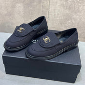 CHANEL 26S LOAFERS IN BLACK CANVAS WITH QUILTED FLAP & CHAIN CC LOGO