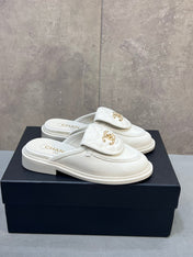 CHANEL 26S MULE LOAFERS IN WHITE CANVAS WITH QUILTED FLAP & CC LOGO