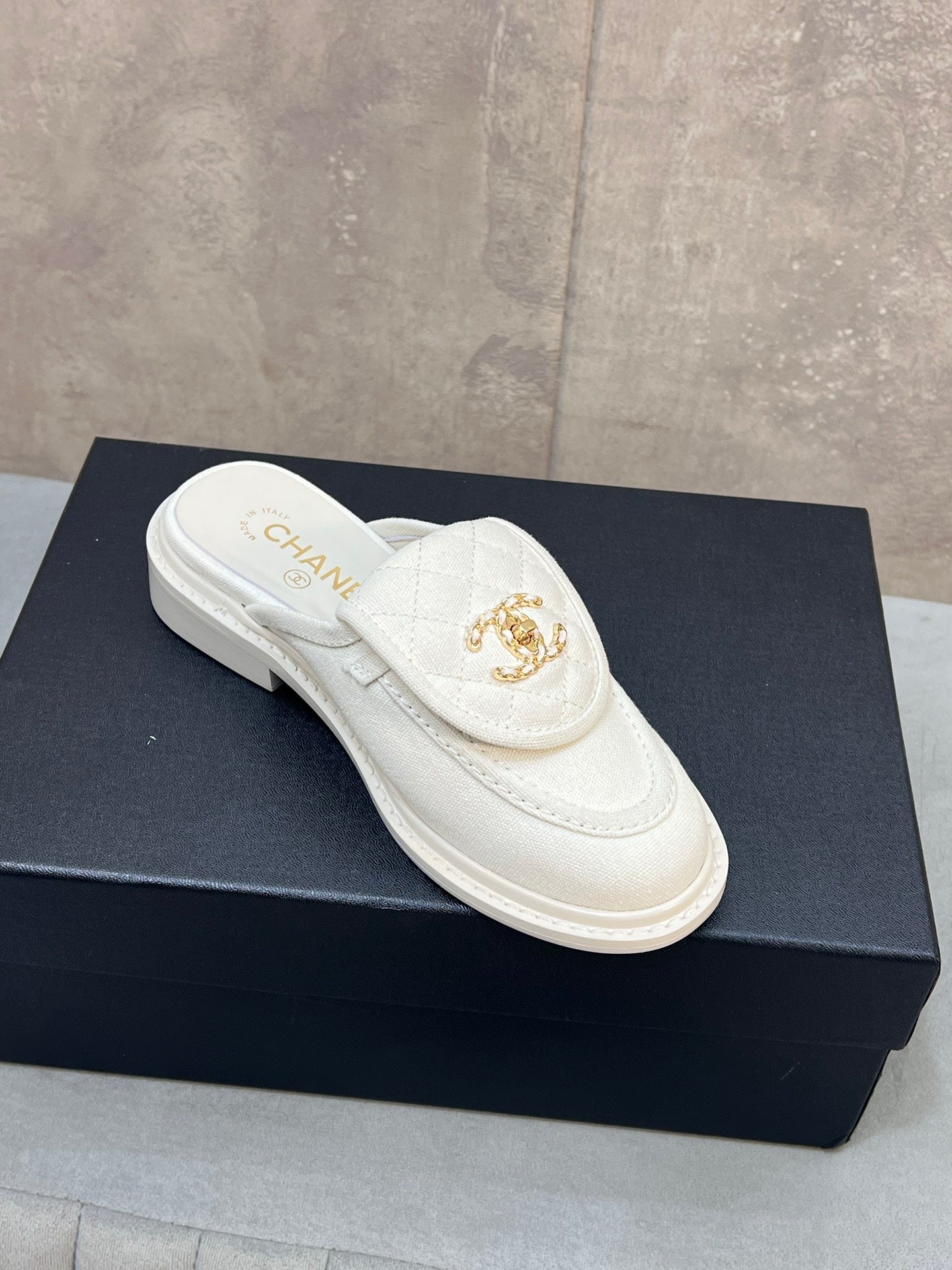 CHANEL 26S MULE LOAFERS IN WHITE CANVAS WITH QUILTED FLAP & CC LOGO