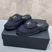 CHANEL 26S MULE LOAFERS IN BLACK CANVAS WITH QUILTED FLAP & CHAIN CC LOGO