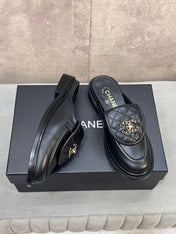 CHANEL 26S MULE LOAFERS IN BLACK QUILTED CALFSKIN WITH CC LOGO