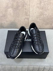 CHANEL 26S RUNNER CC LOGO SNEAKERS IN BLACK CALFSKIN