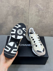 CHANEL 26S RUNNER CC LOGO SNEAKERS IN BEIGE AND GREY CALFSKIN