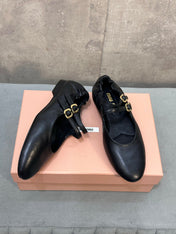 MIUMIU 26S DOUBLE STRAP MARY JANE FLATS IN BLACK SHEEPSKIN
