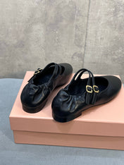 MIUMIU 26S DOUBLE STRAP MARY JANE FLATS IN BLACK SHEEPSKIN