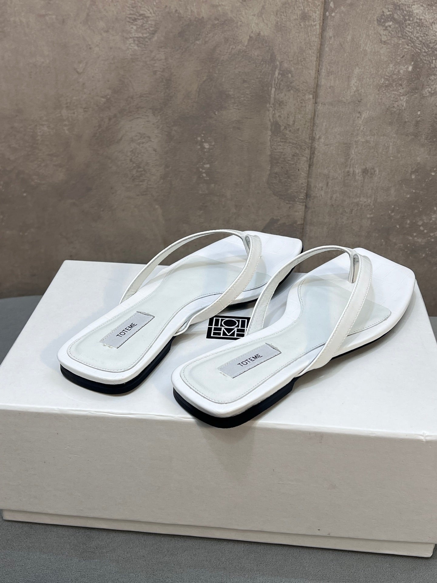 THE ROW 26S SQUARE TOE THONG SANDALS IN WHITE CROCODILE EMBOSSED CALFSKIN