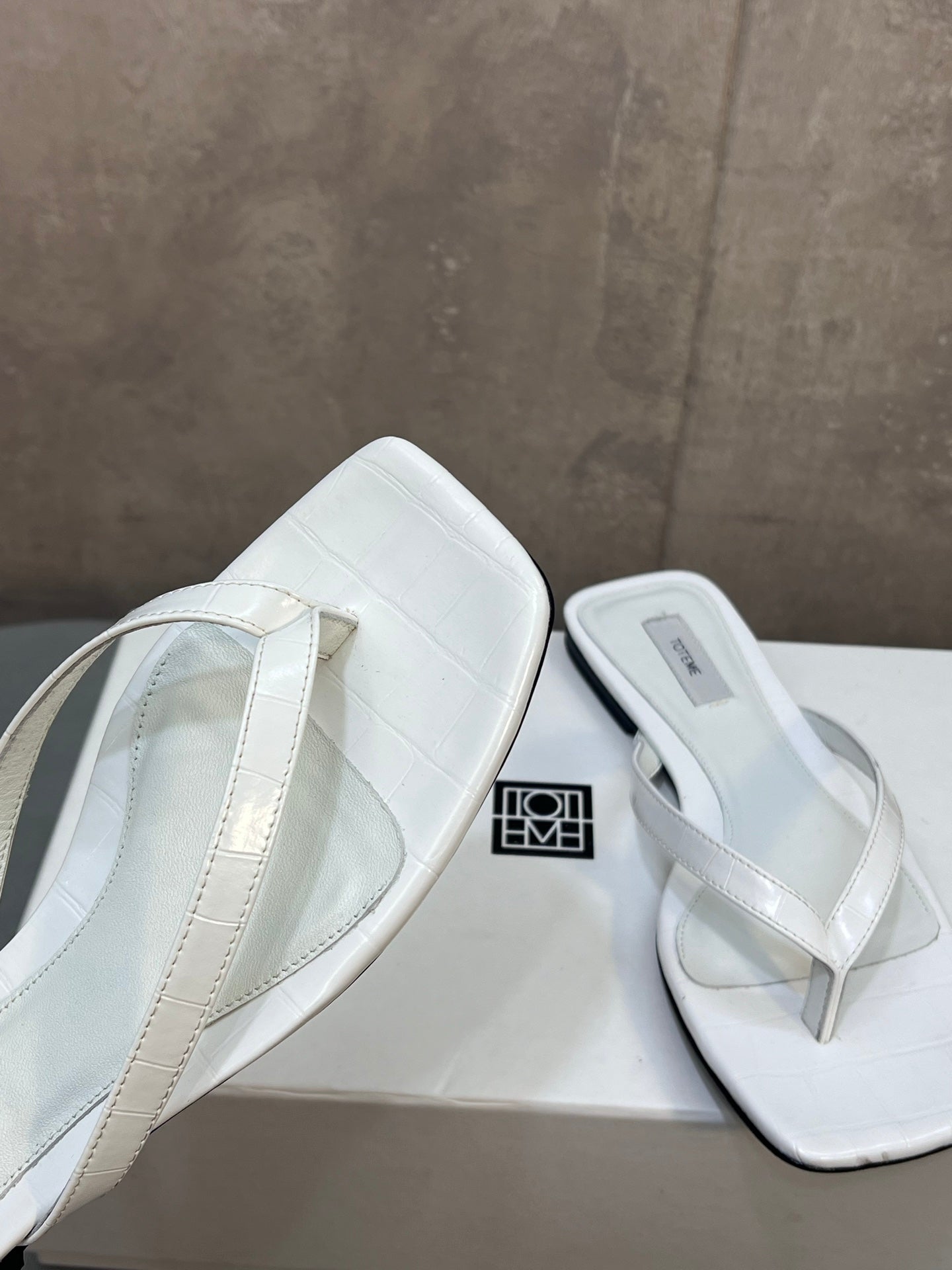 THE ROW 26S SQUARE TOE THONG SANDALS IN WHITE CROCODILE EMBOSSED CALFSKIN