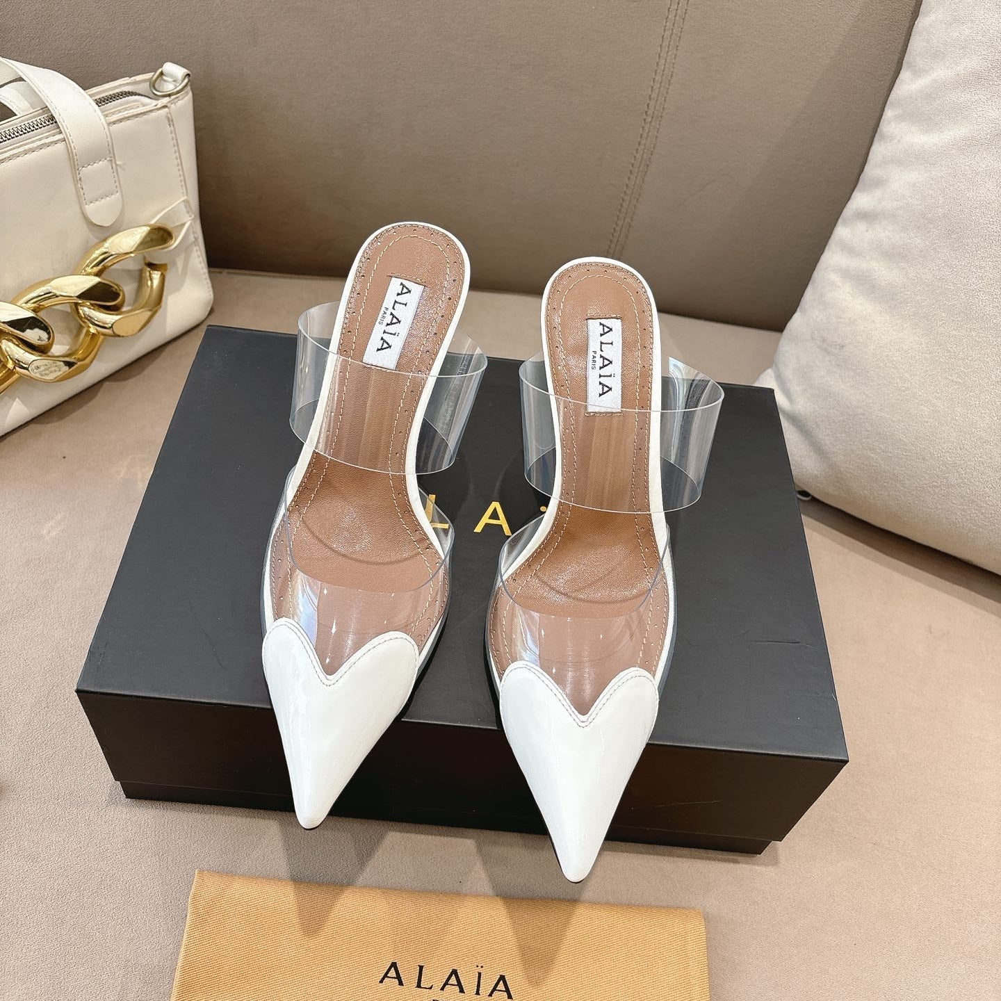 ALAIA 26S HIGH-HEEL WEDGE MULES 95 MM IN WHITE GLOSSY CALFSKIN
