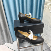 HIGH MARY JANE SHOES BLACK SHEEPSKIN WITH WHITE BOW