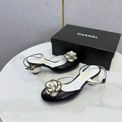CHANEL 26S CAMELLIA PEARL SLINGBACKS IN BLACK CALFSKIN