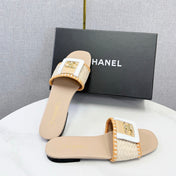 CHANEL 26S WOVEN STRAP SLIDES IN BEIGE AND ORANGE LAMBSKIN