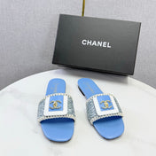 CHANEL 26S WOVEN STRAP SLIDES IN SKY BLUE LAMBSKIN