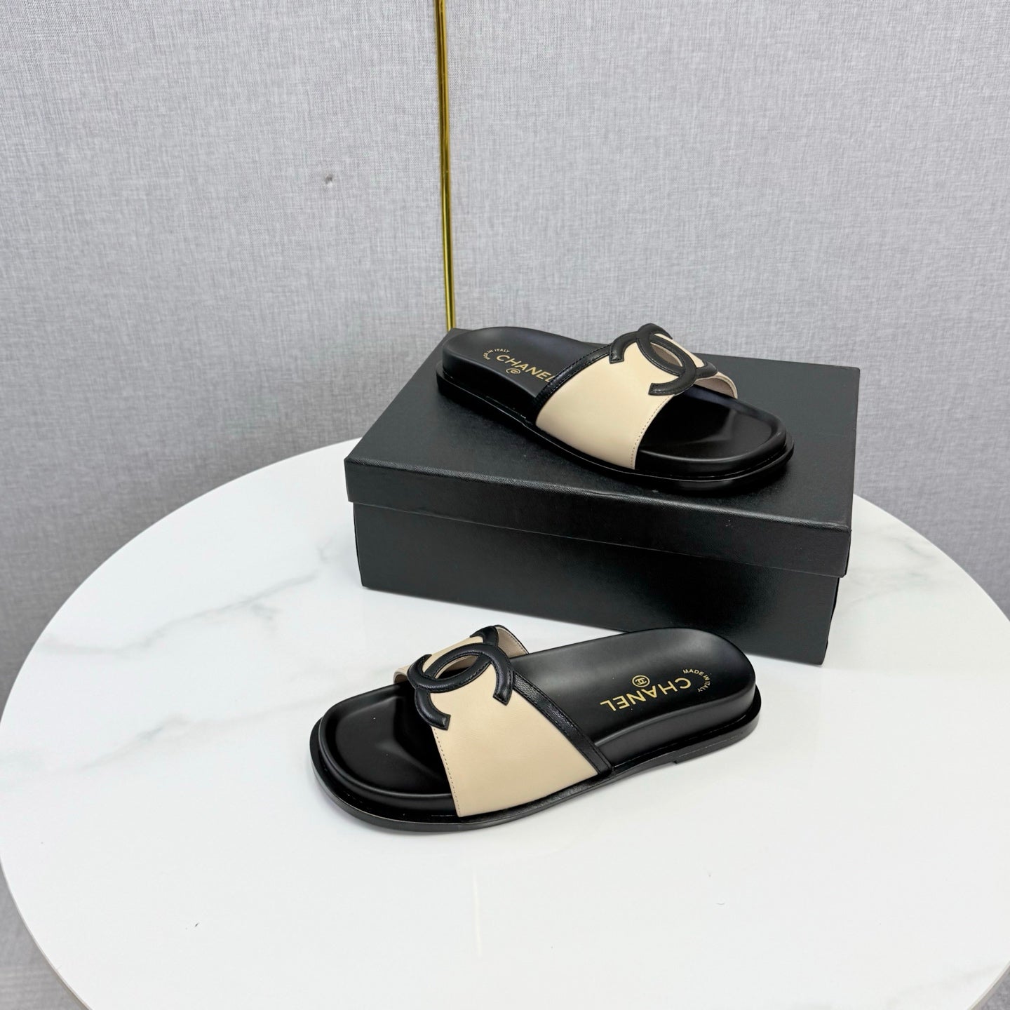 CHANEL 26S ICONIC CC SLIDES IN BEIGE LAMBSKIN