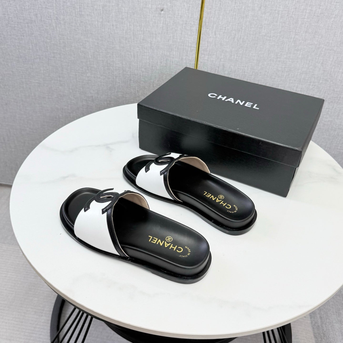 CHANEL 26S ICONIC CC SLIDES IN WHITE LAMBSKIN