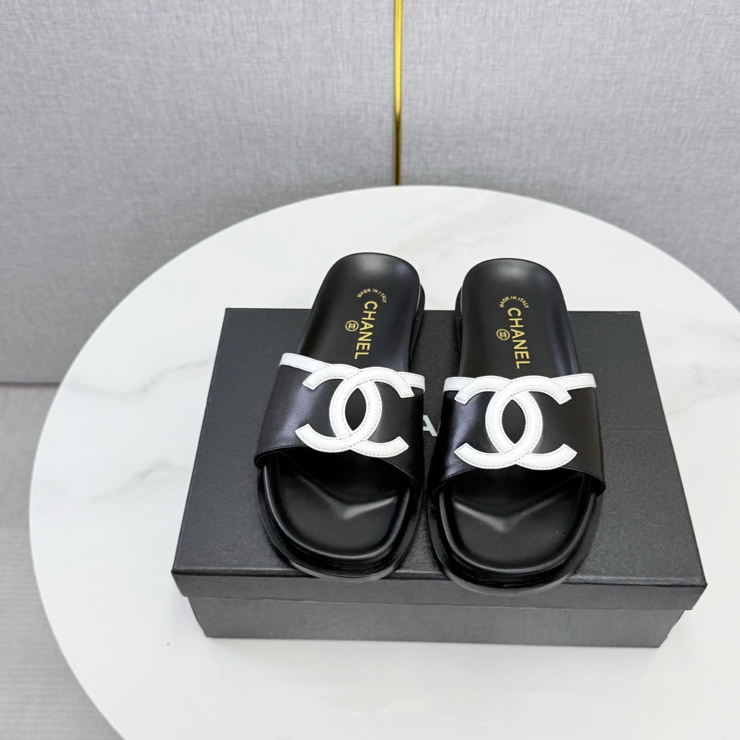 CHANEL 26S ICONIC CC SLIDES IN BLACK LAMBSKIN