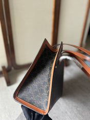 CABAS 37 IN BLACK TRIOMPHE CANVAS AND BRONZE BROWN CALFSKIN TRIM GOLD LOCK